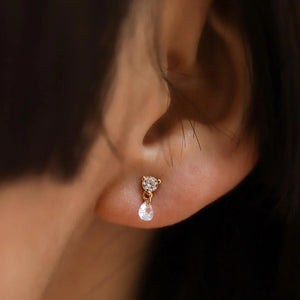TAI ROUND CZ WITH FLOATING PEAR DROP